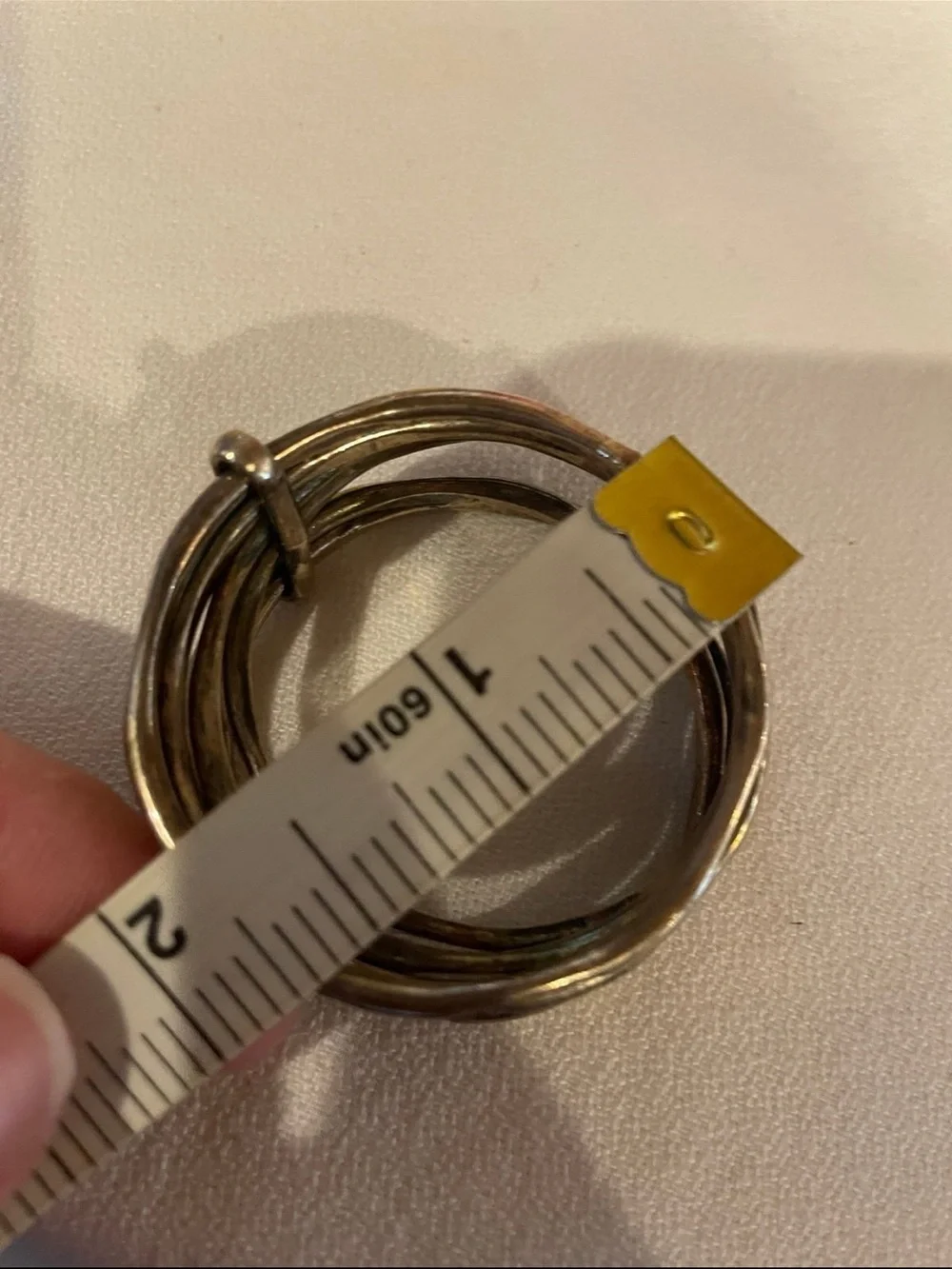 Set of 6 Metal Napkin Rings Tarnished Crome in color